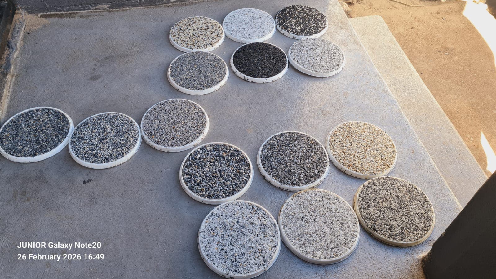 Stone Carpet and aggregate sample discs from Junior Flooring's sample kit